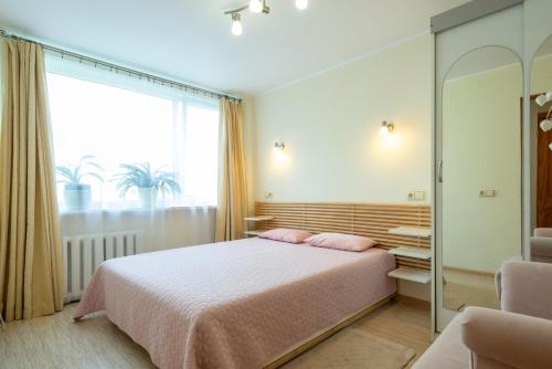 Postel nebo postele na pokoji v ubytování Du draugai 1