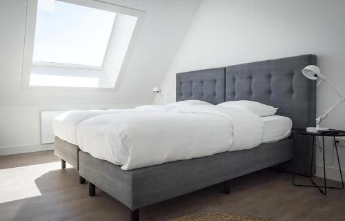 Ένα ή περισσότερα κρεβάτια σε δωμάτιο στο G-17 Bouwlust