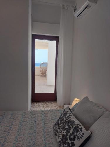 Katil atau katil-katil dalam bilik di Terrazza sul mare