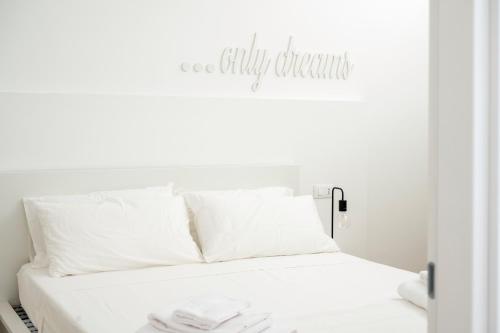 Katil atau katil-katil dalam bilik di Ingrosso Suites in Salento