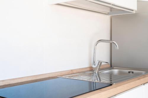 Dapur atau dapur kecil di Ingrosso Suites in Salento
