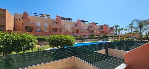 Homes of Spain, Apartamentos Paraiso de Vera Playa, Ed Tahiti, bajo G a pie de la playa, vistas piscina
