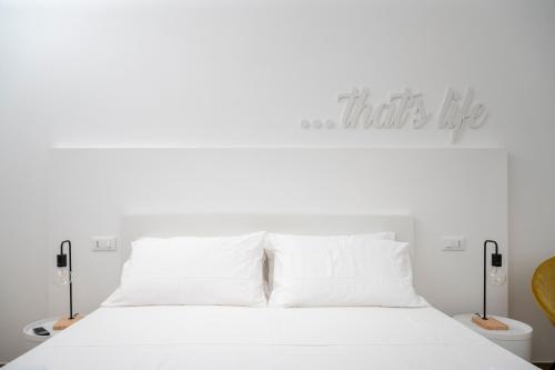 Katil atau katil-katil dalam bilik di Ingrosso Suites in Salento