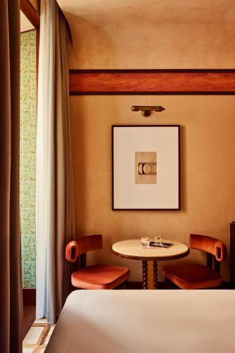 Ένα ή περισσότερα κρεβάτια σε δωμάτιο στο Orient Express La Minerva