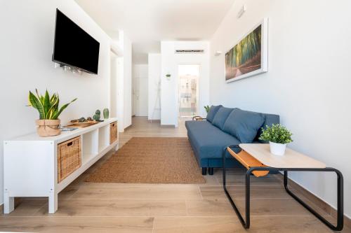 Televisyen dan/atau pusat hiburan di Ingrosso Suites in Salento