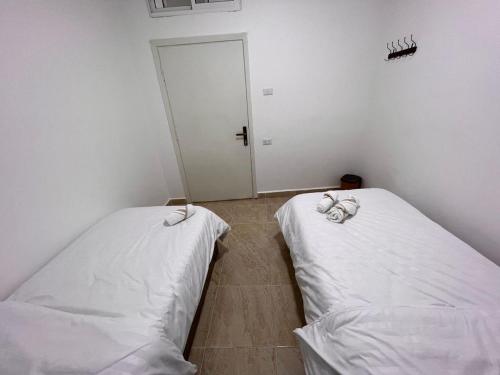 Una cama o camas en una habitación de The guset house