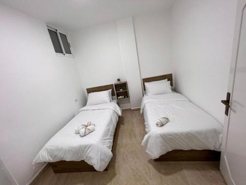 Una cama o camas en una habitación de The guset house