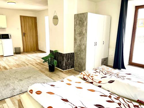 a bedroom with two beds in a room at U Parku, Nová Ves in Křemže