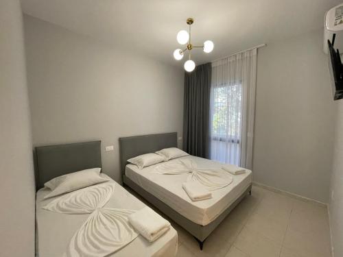 Postel nebo postele na pokoji v ubytování The Wish Palace