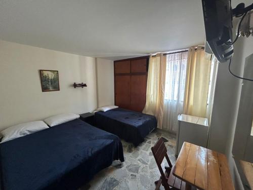 Postel nebo postele na pokoji v ubytování Hotel Mar Azul Inn