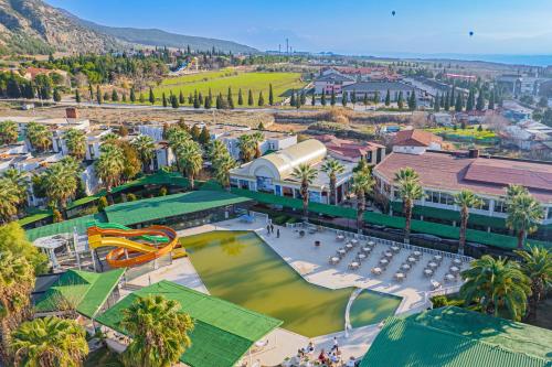 an aerial view of a park with a playground at May Termal Pamukkale in Pamukkale
