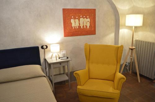 a living room with a couch and a chair at Il Viaggiatore 2 in Anagni