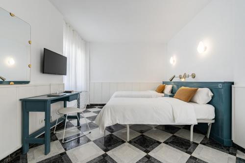 Postel nebo postele na pokoji v ubytování Hotel Agur