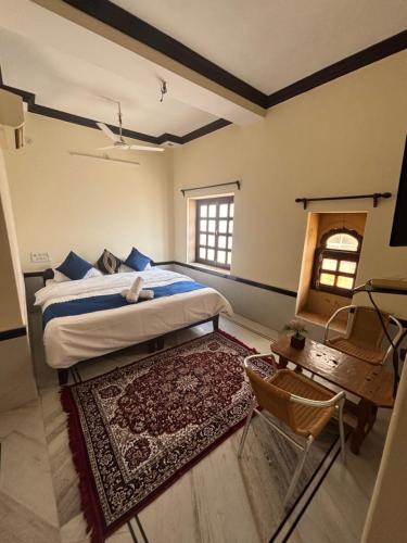 Voodi või voodid majutusasutuse Hotel Jaisalmer Plaza toas