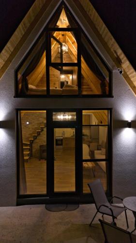 a room with a large window in a house at Wild Beauty Brezna in Pluzine