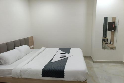 Katil atau katil-katil dalam bilik di Hotel Saffron Groves
