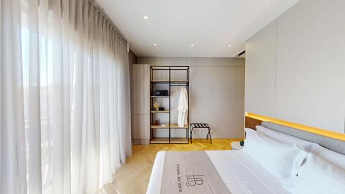 Cama ou camas em um quarto em Harbour Boutique Hotel