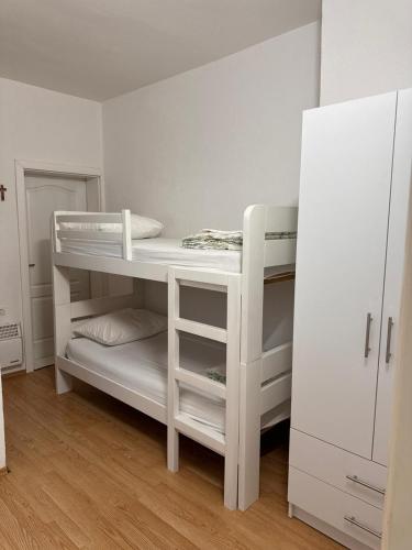 Postel nebo postele na pokoji v ubytování Apartments Kruno