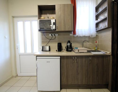 Køkken eller tekøkken på Áron Apartment
