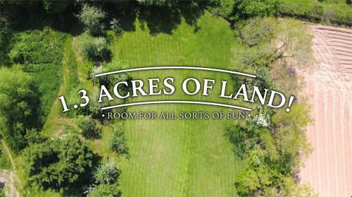 a sign that reads acres of landowment for all sorts of fun at Hot Tub Luxury Glamping - Private Stargazing Patio in Yarpole