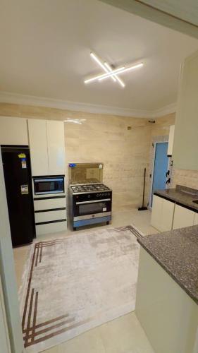 Una cocina o cocineta en الساحل الشمالي