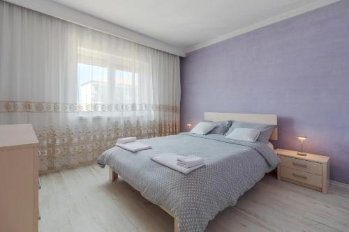 Postel nebo postele na pokoji v ubytování Home Guest - Apartment 7