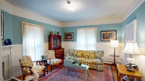 a living room with a couch and chairs at The Red Lion Inn in Stockbridge