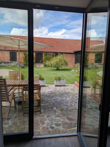 a view of a patio from the window of a house at Ferienwohnung im Kontor Penzlin in Penzlin
