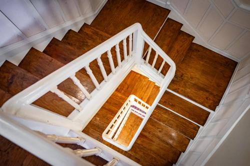 an overhead view of a staircase in a house at Apartamentos San Roque en Llanes by megustarural in Llanes