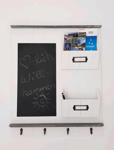 a chalkboard with the words i wish i was running at Ferienwohnung Auszeit im Grünen in Sprockhövel