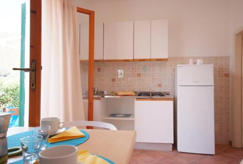 Η κουζίνα ή μικρή κουζίνα στο Casa Vacanze Dino