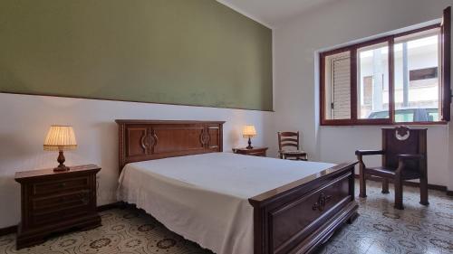 Postel nebo postele na pokoji v ubytování Casa Serena by LoveSud