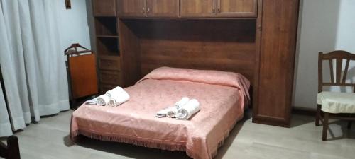 Postel nebo postele na pokoji v ubytování Appartamento nel PARCHEGGIO Cutrupi