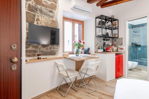 Kuchyň nebo kuchyňský kout v ubytování Suite Exclusive Room