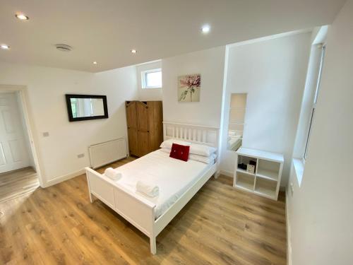 Katil atau katil-katil dalam bilik di Cosy Coombe Retreat