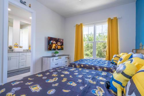 a bedroom with a bed and a large window at Magic Villa Orlando in Orlando