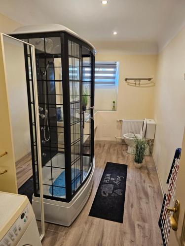 a bathroom with a shower in a room at Summer Lounch in Liepāja