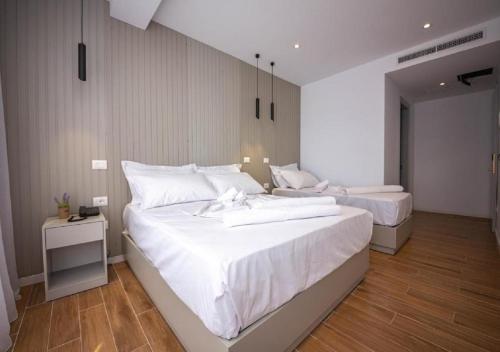 Postel nebo postele na pokoji v ubytování Hesperus Hotel