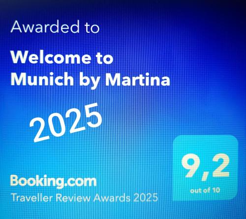 a blue sign that saysived to welcome to munich by marmite at Welcome to Munich by Martina in Munich