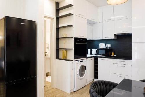 Η κουζίνα ή μικρή κουζίνα στο Rebany Apartman 2 Central Location