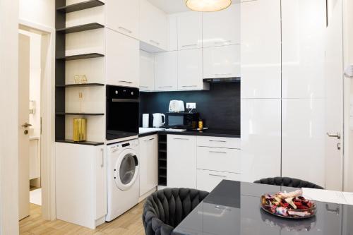 Η κουζίνα ή μικρή κουζίνα στο Rebany Apartman 2 Central Location