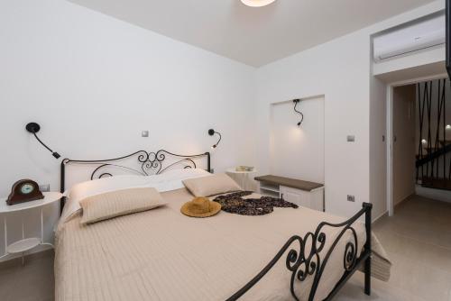A bed or beds in a room at Hvar Villa Maris