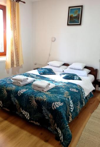 Un ou plusieurs lits dans un hébergement de l'établissement Apartmani Nešović Tara