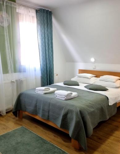 Un ou plusieurs lits dans un hébergement de l'établissement Apartmani Nešović Tara