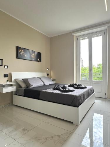 Una cama o camas en una habitación de Otium home