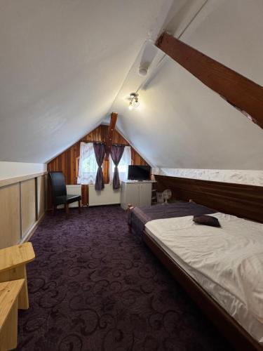 Ένα ή περισσότερα κρεβάτια σε δωμάτιο στο Amandra Chalet