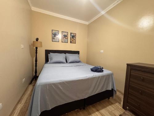 Postel nebo postele na pokoji v ubytování Encanto, conforto e praticidade em um só lugar
