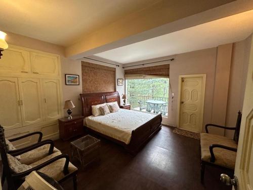 Кровать или кровати в номере Holiday Apartments