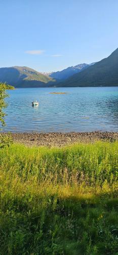 a small boat in the water on a lake at Fredbo in Melåa