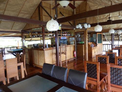 Restaurace v ubytování Villa de Pico Highland Beach Resort